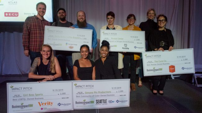 Photo of Impact Pitch 2019 Mission Award Winners with Checks